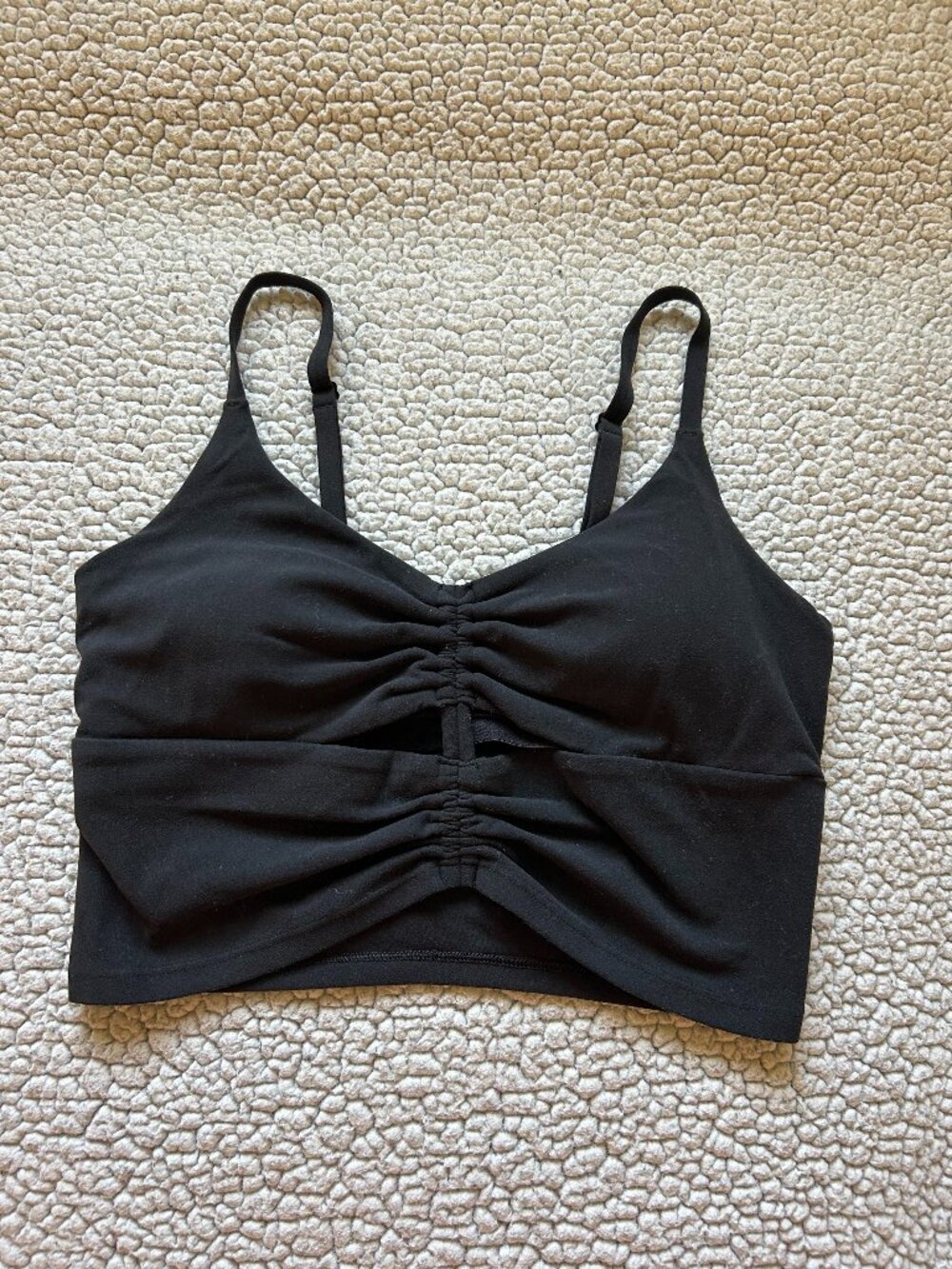 Athleta -- black sports bra, cutout details